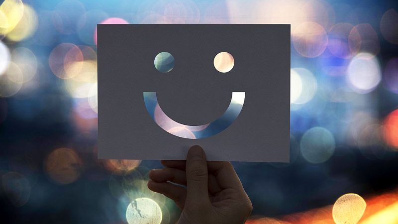 Happines cheerful perforated paper smiley face